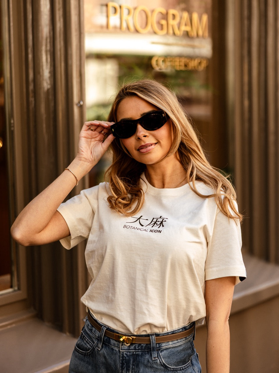 girl wearing botanical icon t-shirt