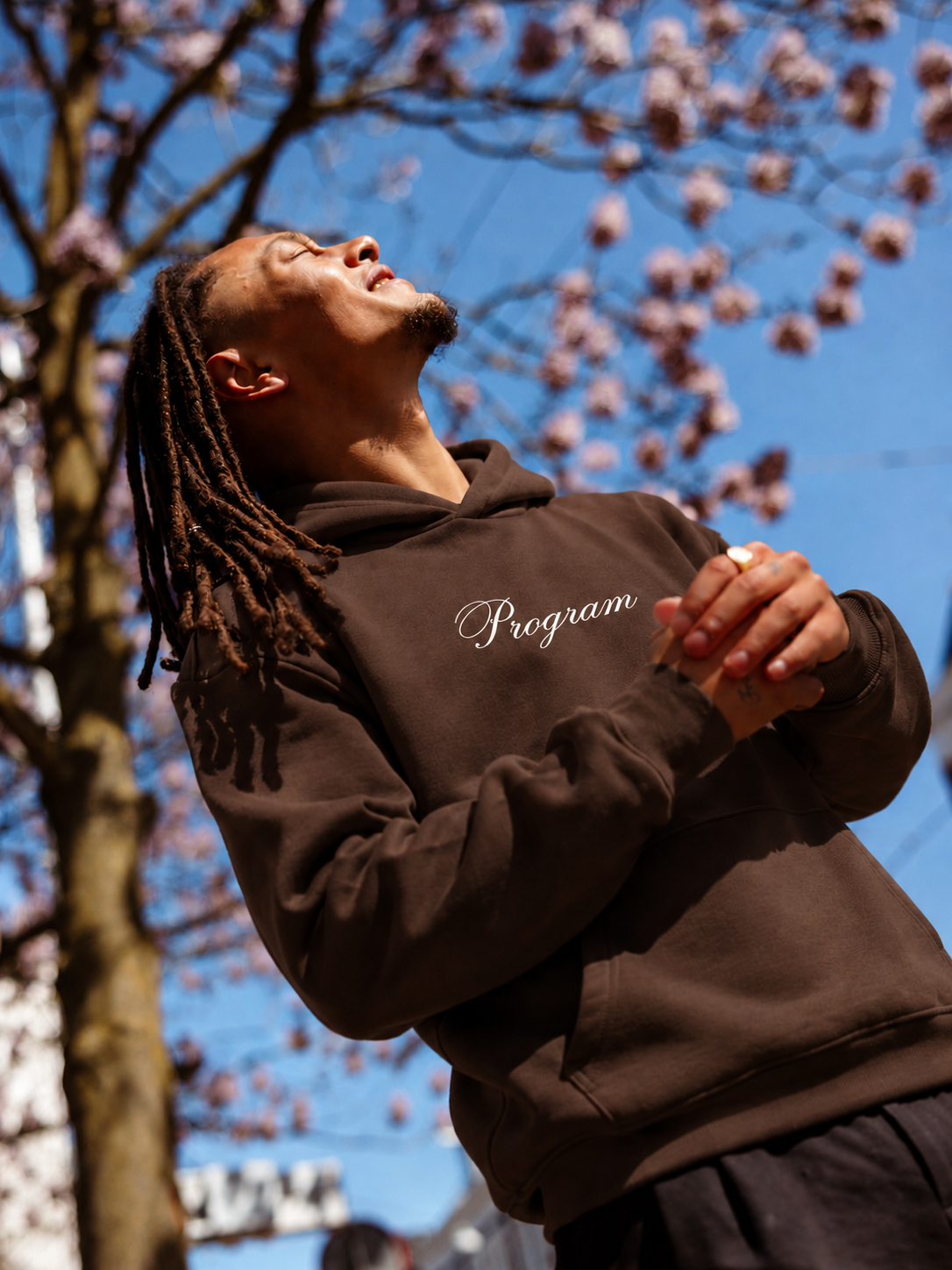 guy wearing brown program hoodie