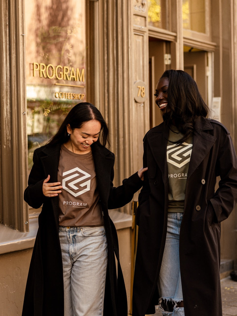 girls wearing brown and green program t-shirt