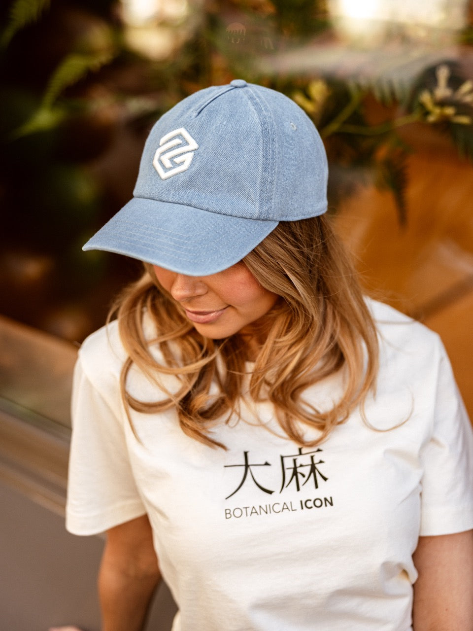 girl wearing blue denim program cap